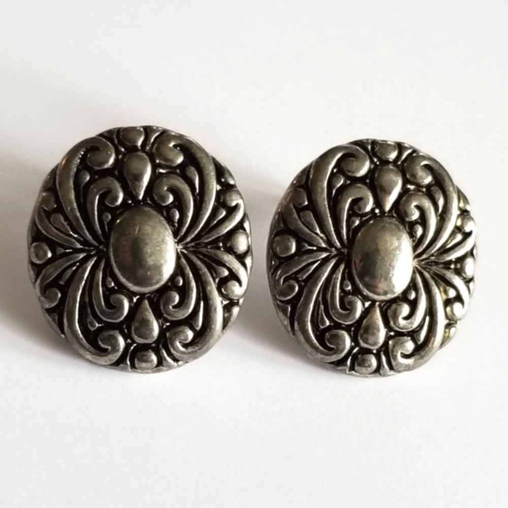 Earrings Silver tone earrings oval stud scrolled design